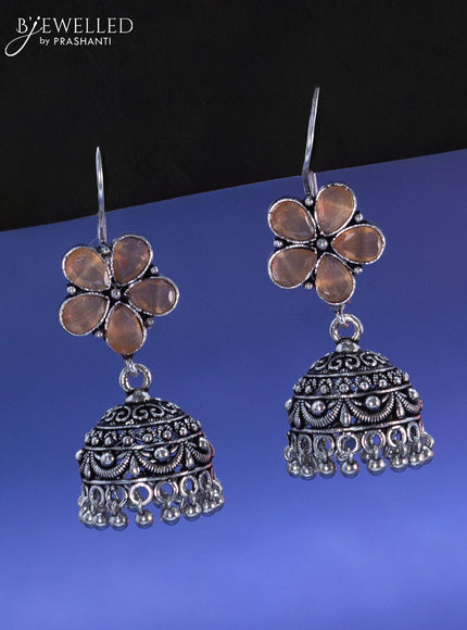 Oxidised hanging type jhumka floral design with peach stone and hangings