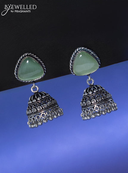 Oxidised jhumka with mint green stone and hangings