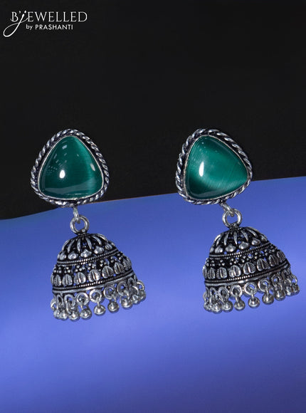 Oxidised jhumka with emerald stone and hangings