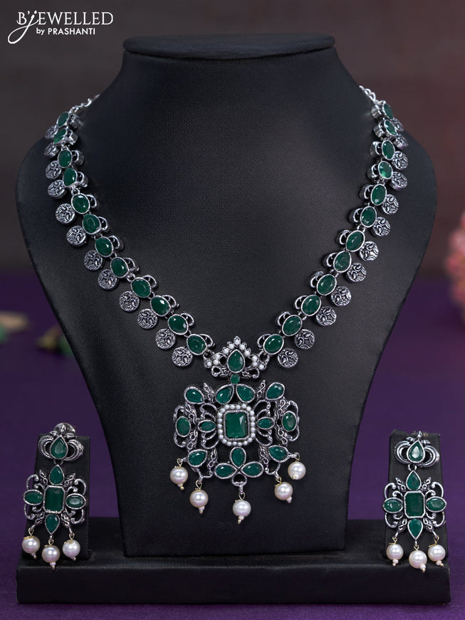 Oxidised necklace with emerald stones and pearl hangings