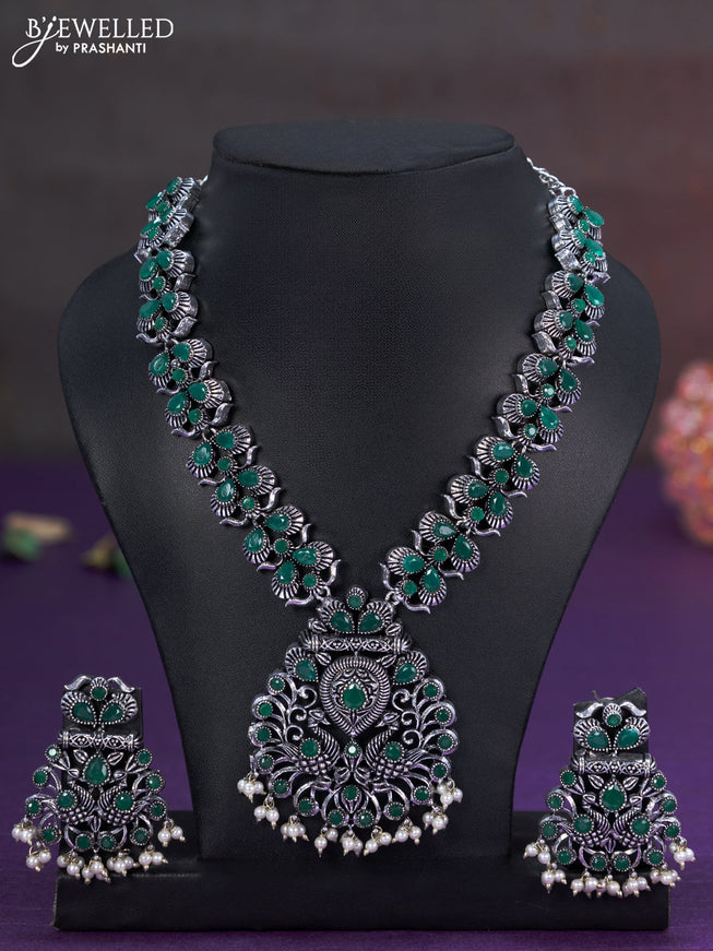 Oxidised necklace with emerald stones and pearl hangings