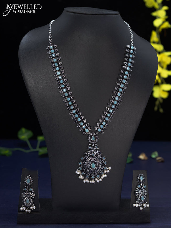 Oxidised haaram with mint green stones and pearl hangings