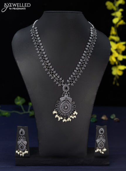 Oxidised haaram with black stones and pearl hangings