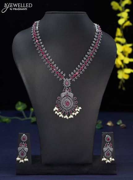 Oxidised haaram with ruby stones and pearl hangings