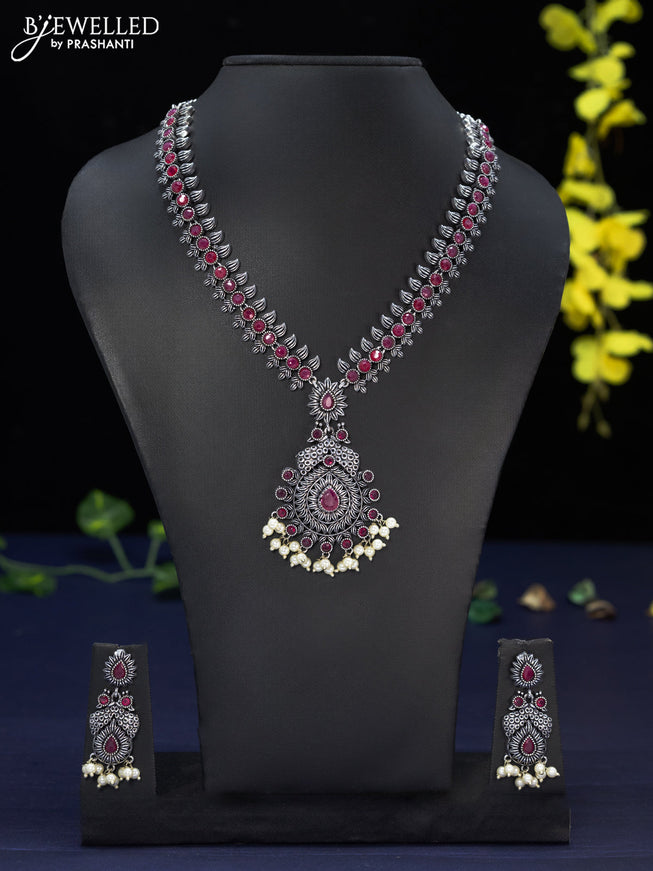 Oxidised haaram with ruby stones and pearl hangings