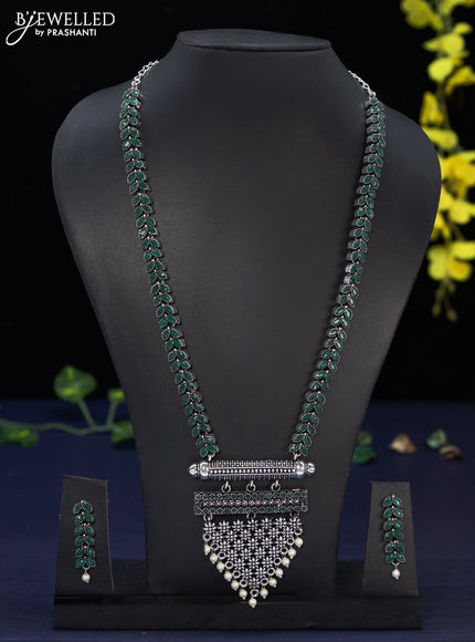 Oxidised haaram leaf design with emerald stones and pearl hangings