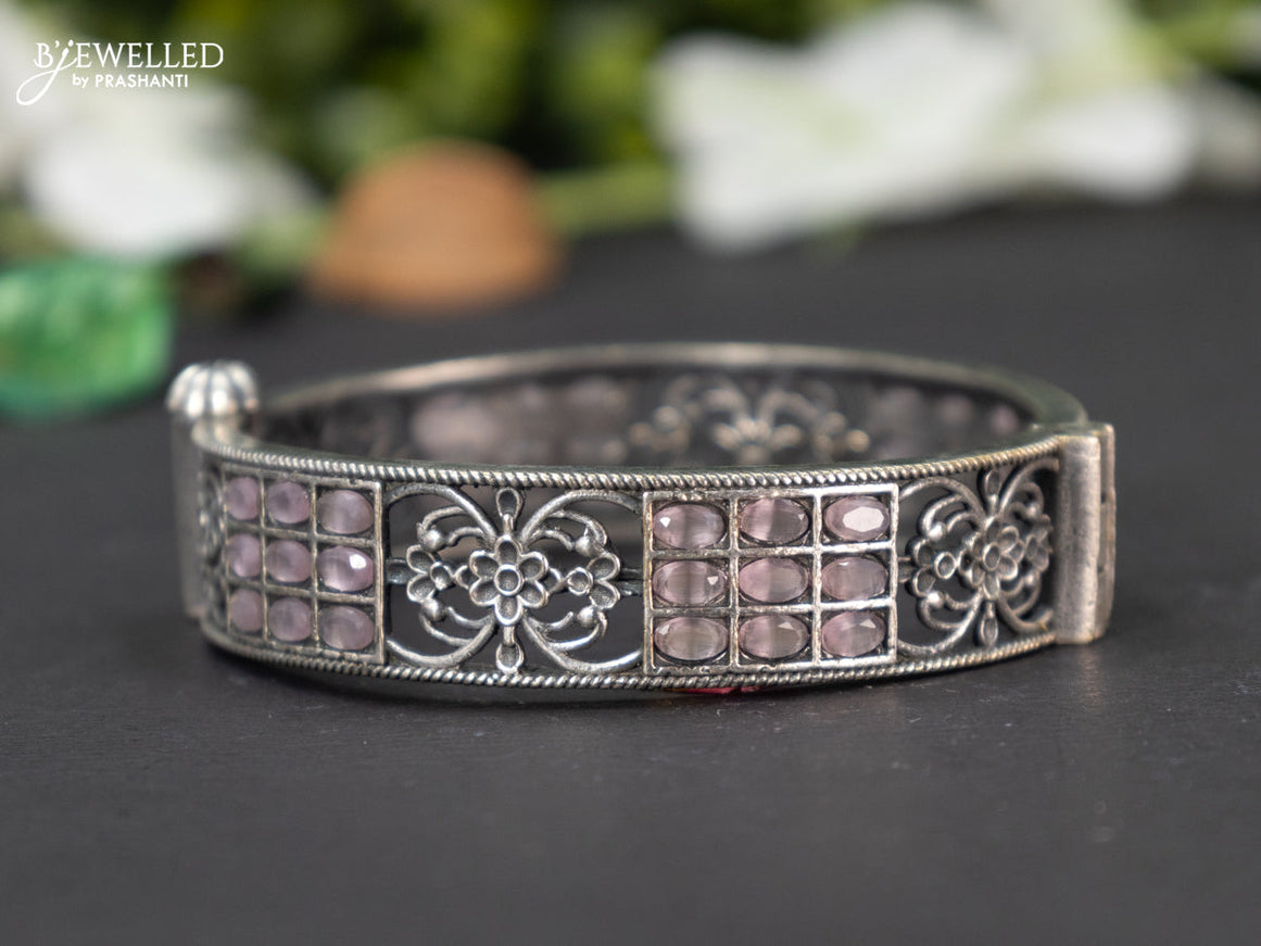 Oxidised screw type bangle with baby pink stones