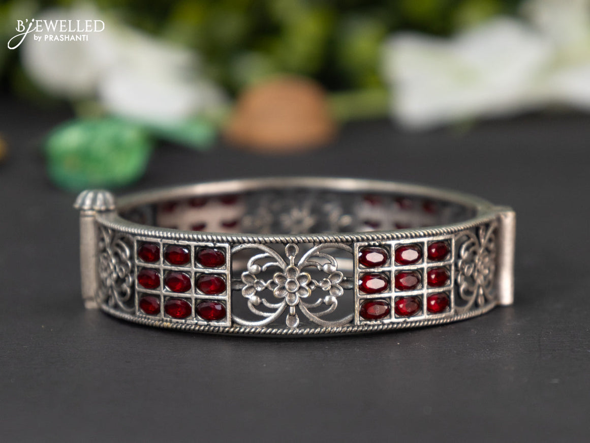 Oxidised screw type bangle with ruby stones