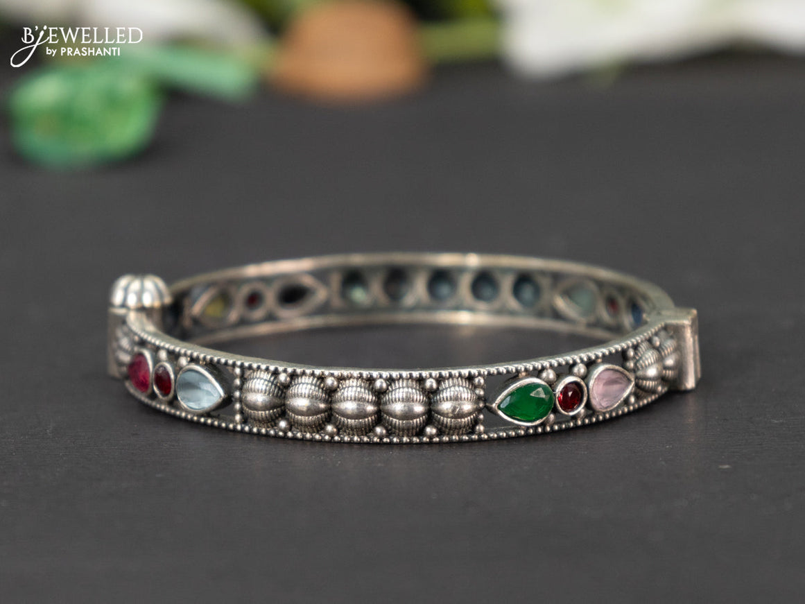 Oxidised screw type bangle with multicolour stones