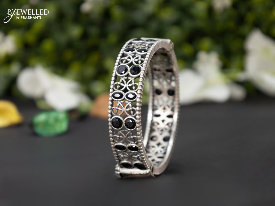 Oxidised screw type bangle with black stones