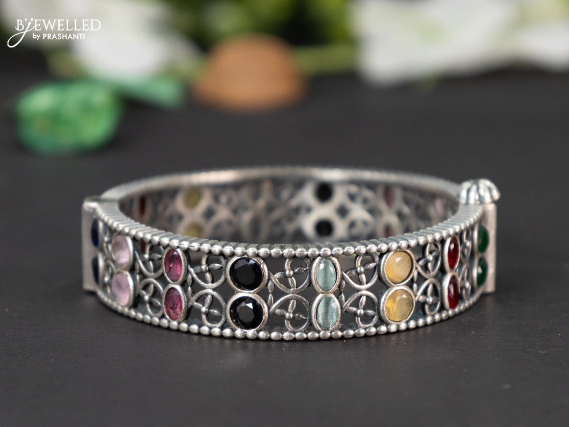 Oxidised screw type bangle with multicolour stones