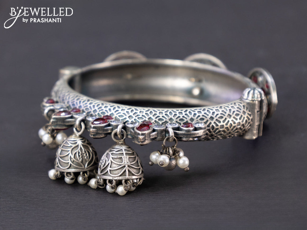 Oxidised screw type bangle with ruby & cz stones and hangings