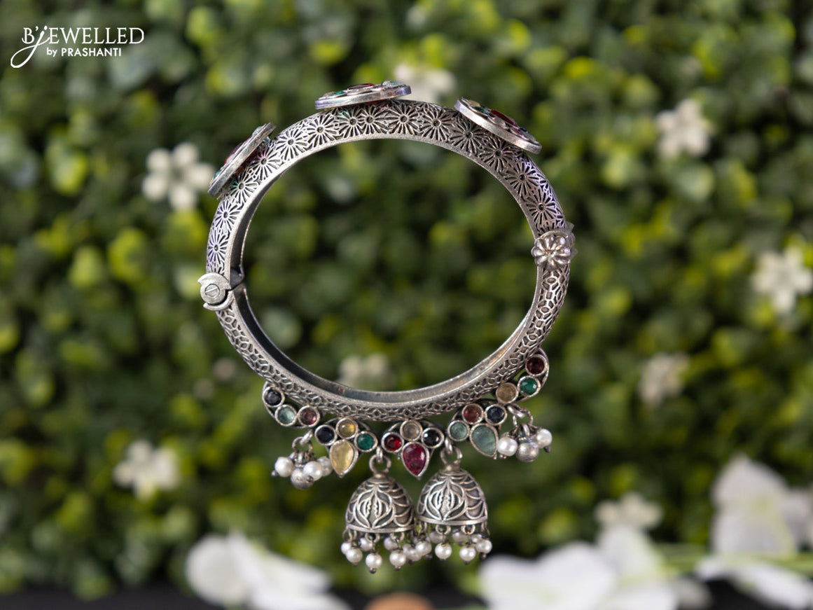 Oxidised screw type bangle with multicolour stones and hangings