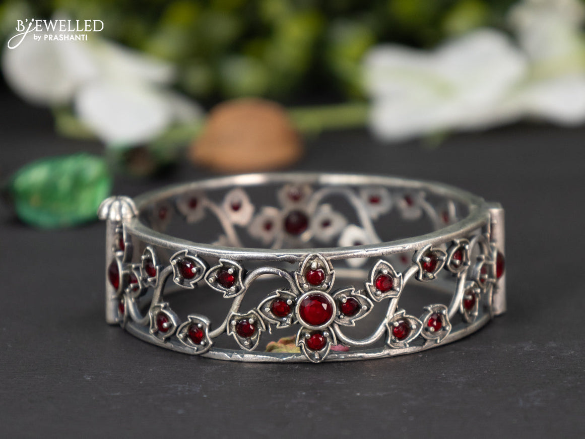 Oxidised screw type bangle with ruby stones