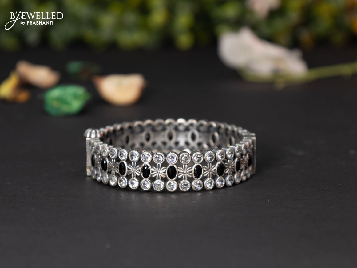 Oxidised screw type bangle with black and cz stones