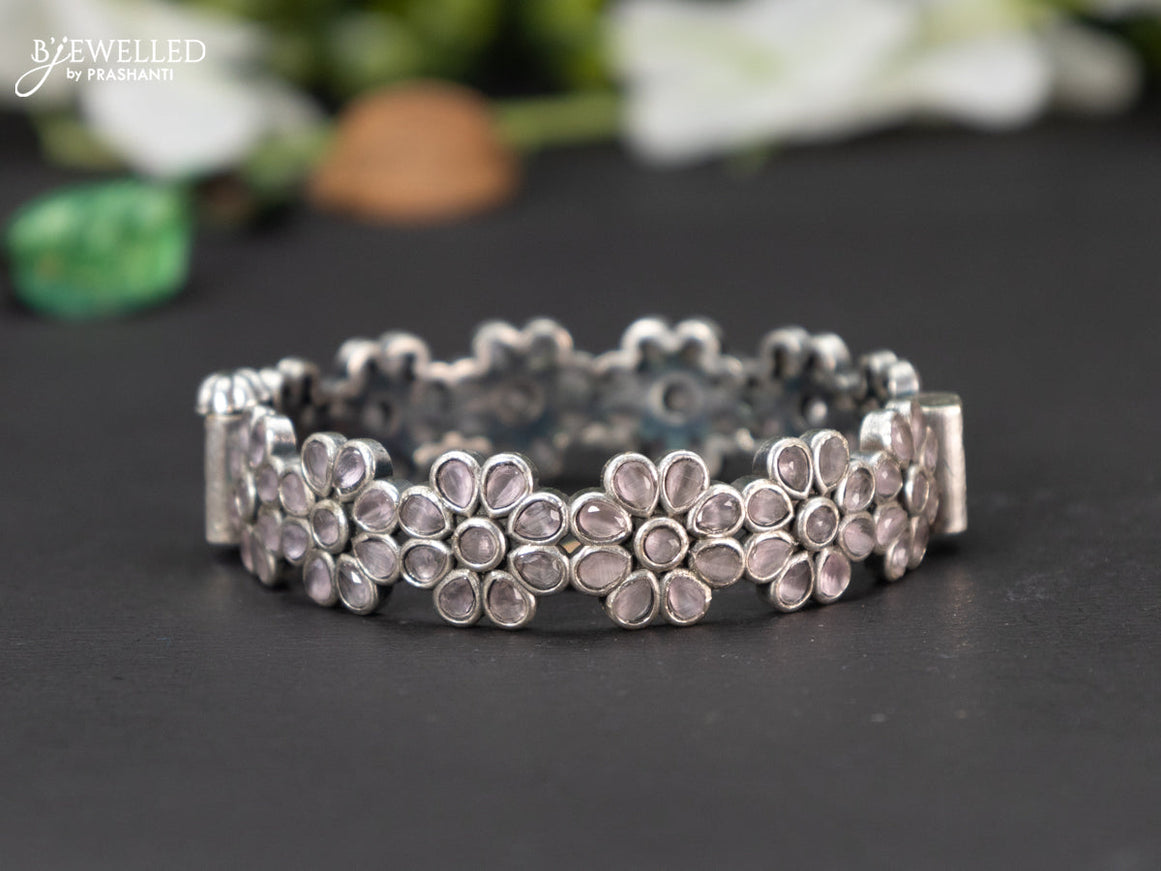 Oxidised screw type bangle floral design with baby pink stones