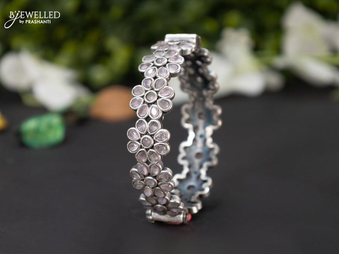 Oxidised screw type bangle floral design with baby pink stones