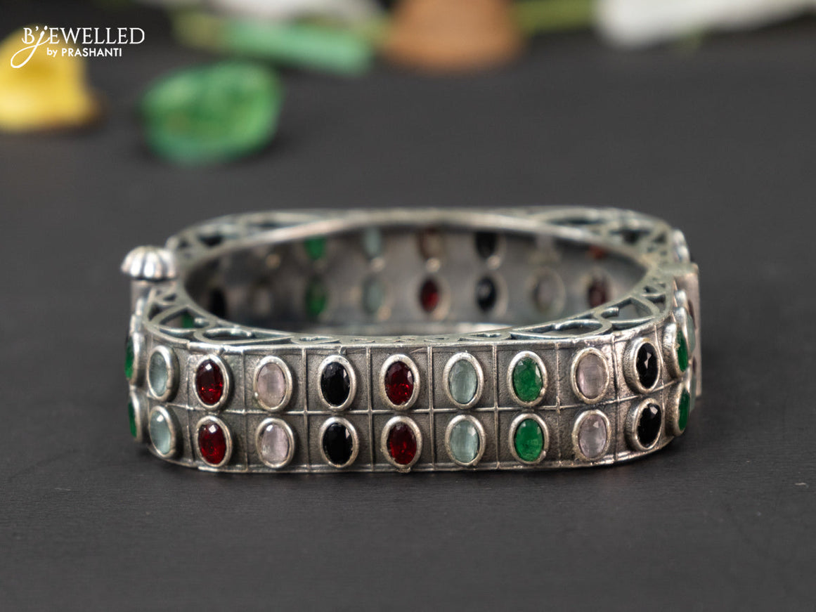 Oxidised screw type bangle with multicolour stones