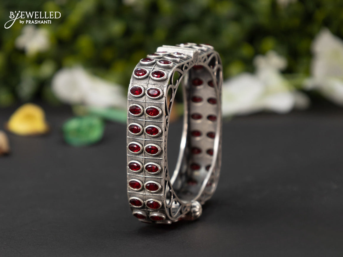 Oxidised screw type bangle with ruby stones