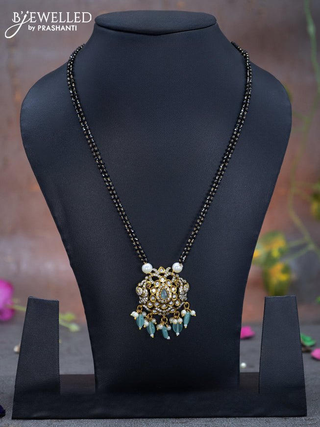 Mangalsutra double layer peacock design with mint green & cz stones and beads hanging without earring