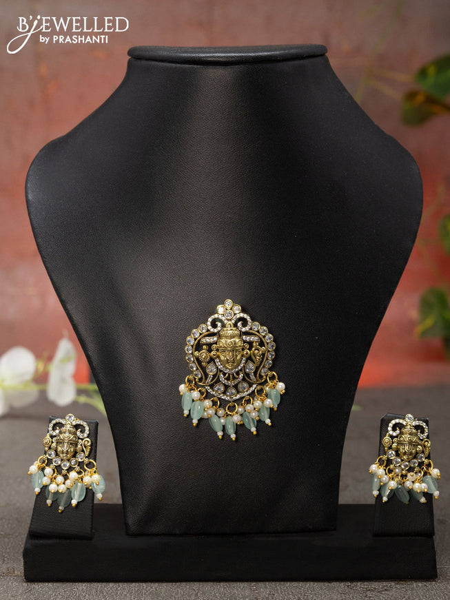 Victorian finish pendant set tirupati balaji design with cz stone and ice blue beads hanging