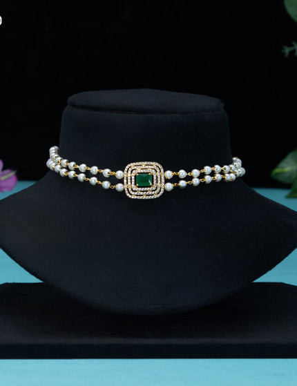 Pearl choker with emerald and cz stones