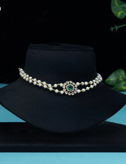 Pearl choker with emerald and cz stones