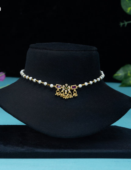 Pearl choker with kemp & cz stones and golden beads hangings