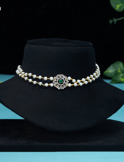 Pearl choker with emerald and cz stones