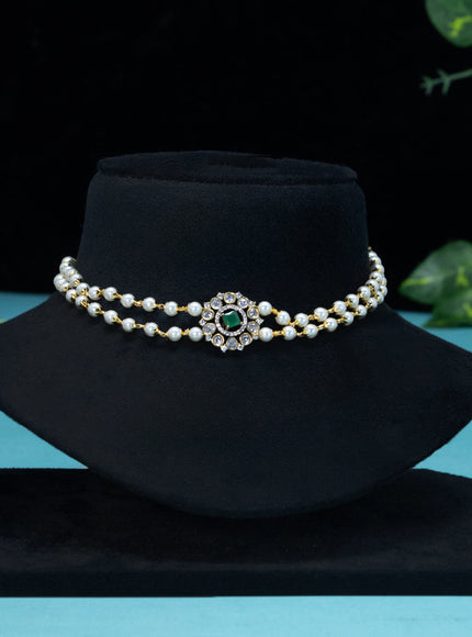 Pearl choker with emerald and cz stones