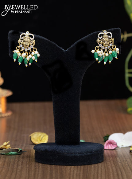 Victorian finish pendant set tirupati balaji design with cz stones and green beads hangings