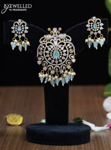 Victorian finish pendant set peacock design with mint green & cz stones and beads hanging