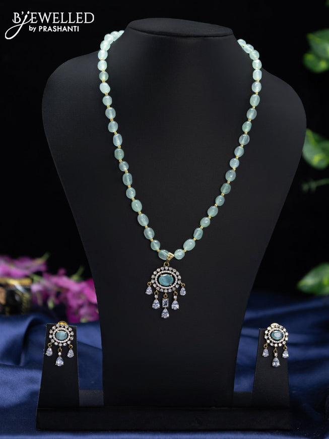 Beaded mint green necklace with mint green & cz stones and hangings in victorian finish