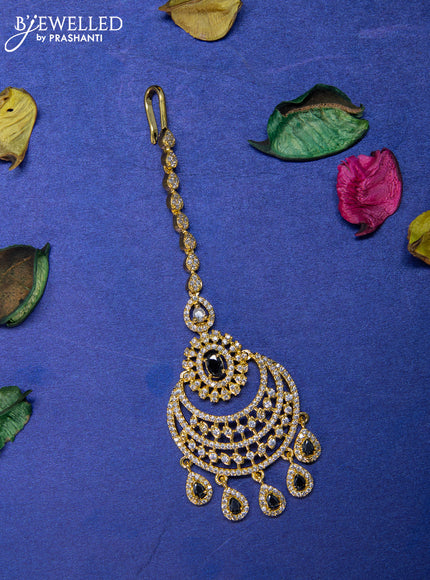 Zircon maang tikka with black & cz stones and hangings in gold finish