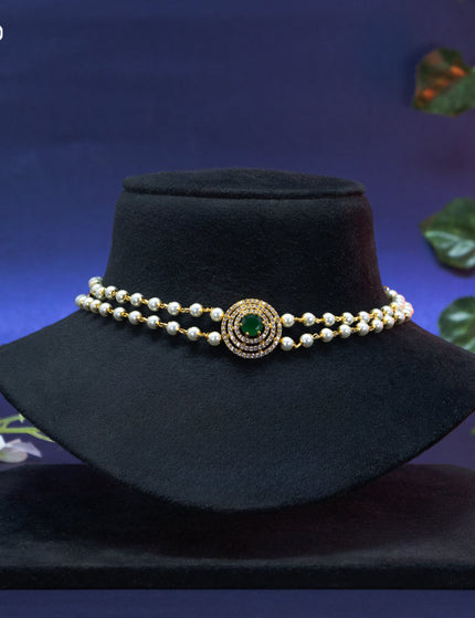 Pearl choker with emerald and cz stones