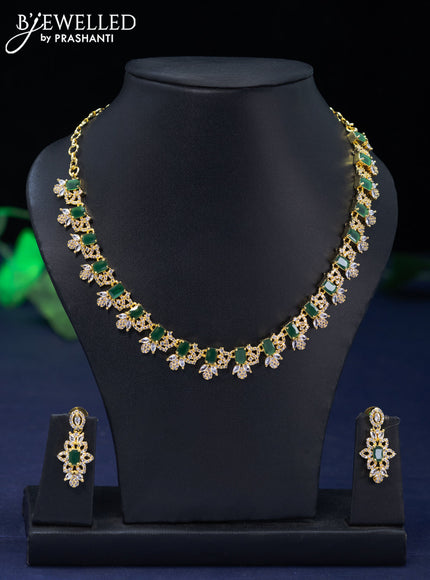 Zircon necklace with emerald and cz stones in gold finish