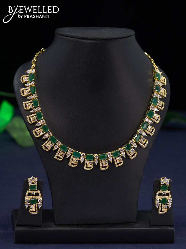 Zircon necklace with emerald and cz stones in gold finish