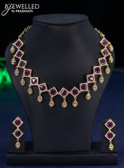 Zircon necklace with ruby & cz stones and hangings in gold finish