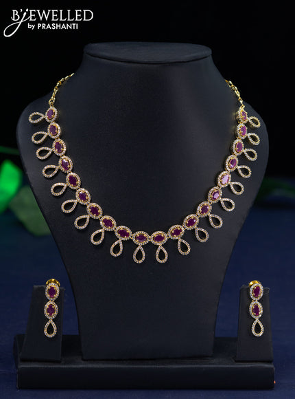 Zircon necklace with ruby and cz stones in gold finish