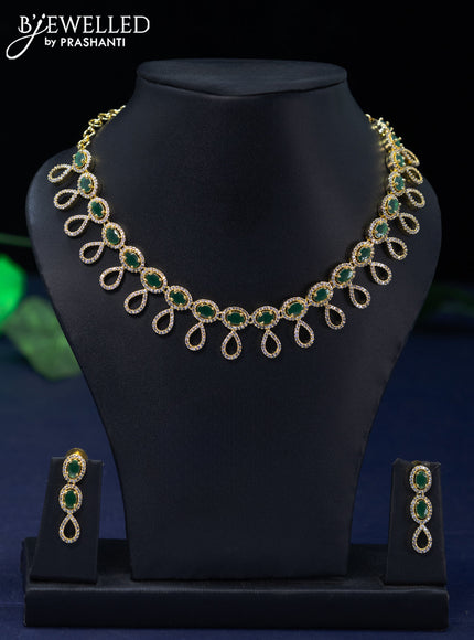 Zircon necklace with emerald and cz stones in gold finish