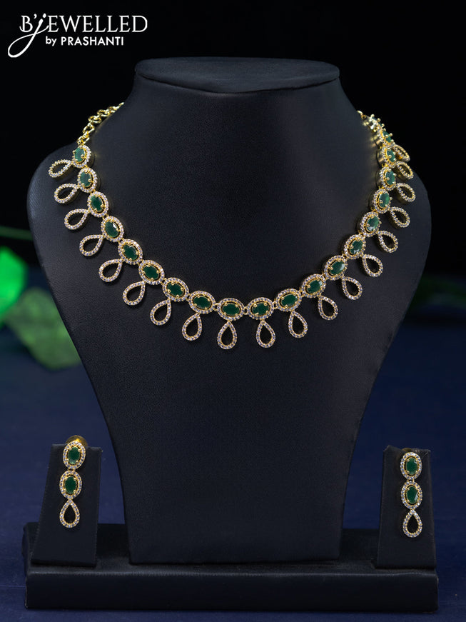 Zircon necklace with emerald and cz stones in gold finish