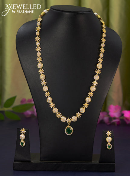 Zircon haaram with emerald and cz stones in gold finish