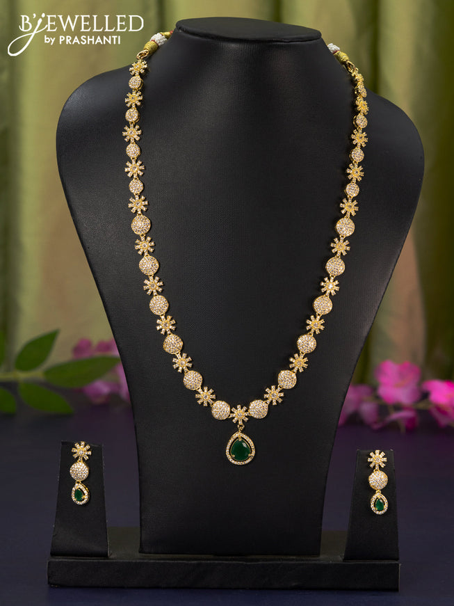 Zircon haaram with emerald and cz stones in gold finish