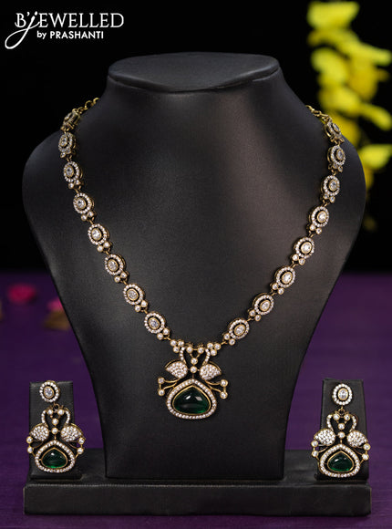 Necklace swan design with emerald and cz stones in victorian finish