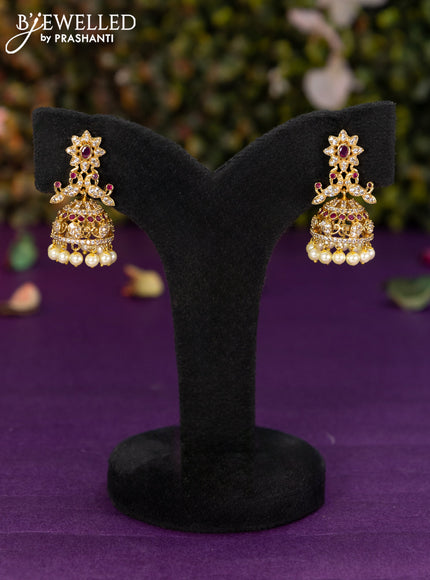 Antique jhumka peacock design with pink kemp & cz stones pearl hangings