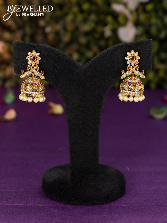 Antique jhumka peacock design with pink kemp & cz stones pearl hangings