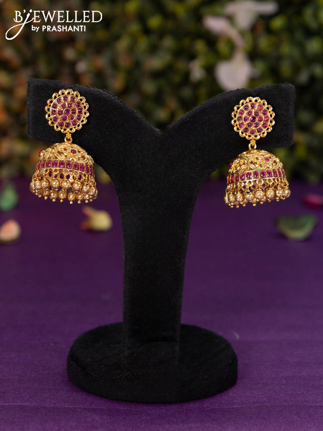 Antique jhumka with pink kemp stones and golden beads hangings