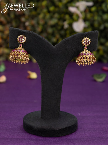 Antique jhumka with pink kemp stones and golden beads hangings