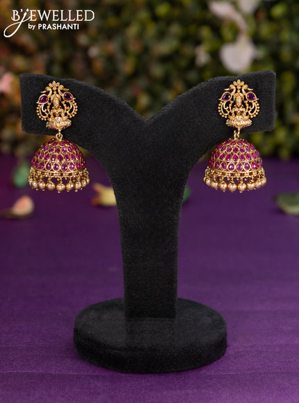 Antique jhumka lakshmi design with pink kemp stones and golden beads hangings