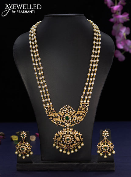 Pearl haaram peacock design with kemp & cz stones and pearl hangings